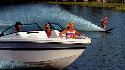 Wakeboarder being pulled by boat